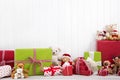 White christmas wooden background with teddy bears and presents Royalty Free Stock Photo