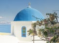 White Church with blue dome at Oia, Santorini, Greek Islands Royalty Free Stock Photo