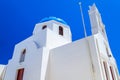 White church with blue dome in Oia town on Santorini island, Greece Royalty Free Stock Photo