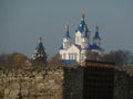 White church with blue roofs and golden domes. Royalty Free Stock Photo