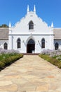 White Church in Franschhoek in front of blue sky Royalty Free Stock Photo