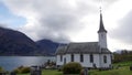 Church of Nes at the Lusterfjord in autumn in Norway