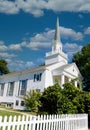 White Church Past Picket Fence Royalty Free Stock Photo