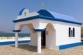 White church in traditional Greek colors on Rhodes island, Greece Royalty Free Stock Photo