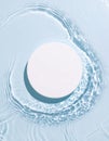 White Circle on Blue Water Surface with Ripples Royalty Free Stock Photo