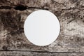 White circle paper and space for text on old wooden background Royalty Free Stock Photo