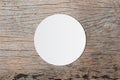 White circle paper and space for text on old wooden