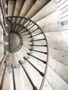 White circular staircase spiral stairs in old house