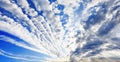 White cirrocumulus clouds blue sky background panorama, altocumulus cloudy skies panoramic view, stratocumulus cloud texture Royalty Free Stock Photo