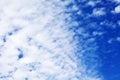 White cirrus clouds blue sky background closeup, fluffy cumulus cloud texture, cloudscape, cloudy weather, cloudiness, ozone layer Royalty Free Stock Photo