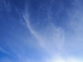 White cirrus clouds formations on blue sky, texture background Royalty Free Stock Photo