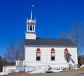 White clapboard New England church in winter Royalty Free Stock Photo