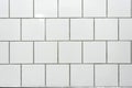 White classic ceramic tiles on the wall in the bathroom Royalty Free Stock Photo