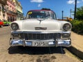 White classic Cuban vintage car. American classic car on the road in Havana, Cuba. Royalty Free Stock Photo