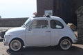 white classic Fiat 500