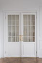 White classic swing doors with glass in the living room