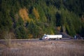 White classic truck with trailers on highway background autumn Royalty Free Stock Photo