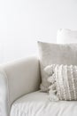 White and clean couch with decorative cushions