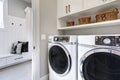 White clean laundry modern room with washer and dryer Royalty Free Stock Photo