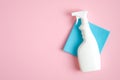 White cleaner spray bottle and blue rag. Flat lay, top view. House cleaning service and housekeeping concept Royalty Free Stock Photo