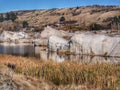 White cliffs reflections at the Blue Lake at St Bathans in New Zealand