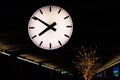 White clock without digits in some Airport or Railway station. Time no time concept Royalty Free Stock Photo