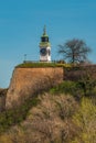 The white Clock tower, one of the most significant landmarks and symbols of Petrovaradin Fortress Royalty Free Stock Photo