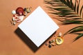 White close square gift box mockup template. Package clipart. Summer flat lay on beige background