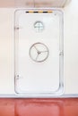 White closed watertight door in a ship Royalty Free Stock Photo