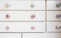 White closet doors with colorful knobs Royalty Free Stock Photo