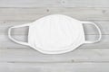 White Cloth Mask Mockup on Gray Wood