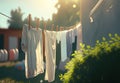 White clothes dries in the yard. Generative AI Royalty Free Stock Photo
