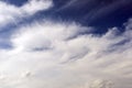 White cloud against the blue of the sky in the shape of the face Royalty Free Stock Photo