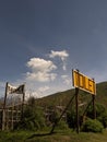 A white cloud behind the toilet sign at bromo mountain Royalty Free Stock Photo