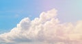 White cloud on blue sky. Cloudscape photo background. Romantic skyscape with cloud and pink sun flare. Royalty Free Stock Photo