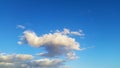 White cloud in a clear blue sky. Heaven abstract calm and pacefull theme