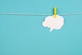 White cloud hanging on a line, empty copy space for text, blue background, communication and marketing concept, being connected