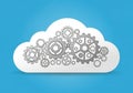 A white cloud icon filled with interlocking gray gears on a blue background Royalty Free Stock Photo