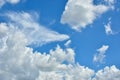 White clouds against blue sky for a backgrounds