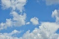 White clouds against blue sky for a backgrounds