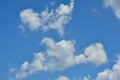 White clouds against blue sky for a backgrounds