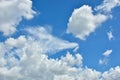 White clouds against blue sky for a backgrounds