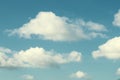 White clouds against blue sky on sunny summer day. Cloudscape background Royalty Free Stock Photo