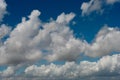 White clouds and airplanes in the clouds Royalty Free Stock Photo