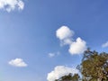 Clouds in the blue sky and view tree. Royalty Free Stock Photo