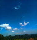 white clouds in the beautiful blue sky in the distance very nice Royalty Free Stock Photo