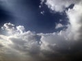 White Clouds blocking the Sun creating a beautiful array of rays.