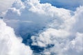 White clouds on blue sky background close up, cumulus clouds high in azure skies, beautiful aerial cloudscape view from above Royalty Free Stock Photo