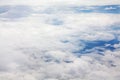 White clouds on blue sky background view from above, airplane flight landscape, beautiful aerial cloudscape, skies backdrop Royalty Free Stock Photo