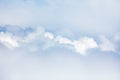 White clouds on blue sky background view from above, airplane flight landscape, beautiful aerial cloudscape, skies backdrop Royalty Free Stock Photo